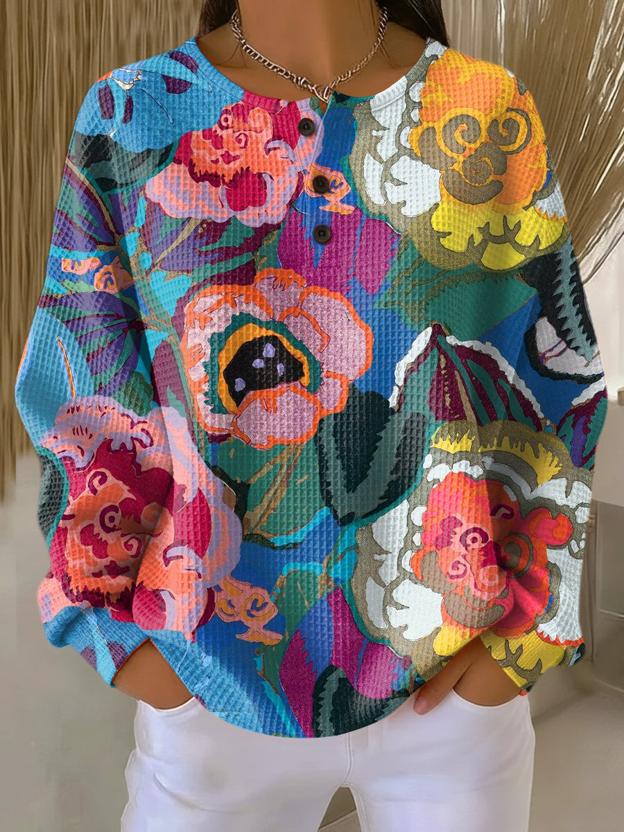 Adoración | Jersey con grandes flores de colores