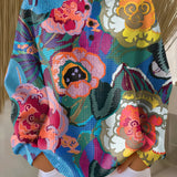 Adoración | Jersey con grandes flores de colores