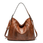 Andrea | Bolso de piel con flecos