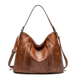 Andrea | Bolso de piel con flecos