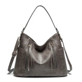 Andrea | Bolso de piel con flecos