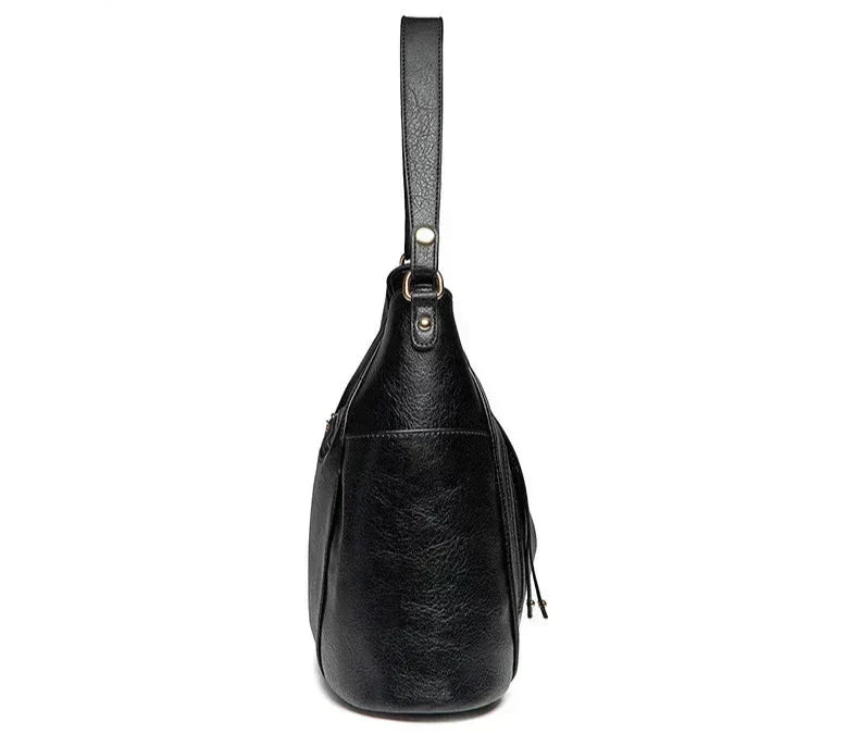 Andrea | Bolso de piel con flecos