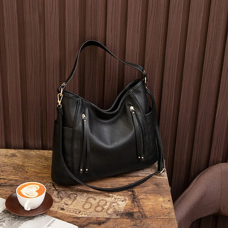 Andrea | Bolso de piel con flecos