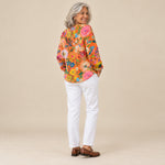 Ángela | Jersey con estampado floral colorido, vista de espaldas