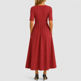 Aránzazu Belén | Vestido cruzado elegante