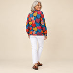 Berta | Cárdigan con estampado de corazones multicolores, vista de espaldas