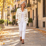 Gertrudis | Chaqueta marfil con bordado floral y volantes, en la calle