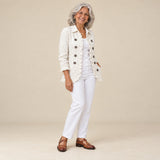 Gertrudis | Chaqueta marfil con bordado floral y volantes, vista de tres cuartos