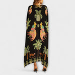 Leticia | Vestido de hombros descubiertos con hombro asimétrico y estampado de palmeras