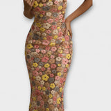 Nuria | Vestido largo con lentejuelas florales estilo años 80