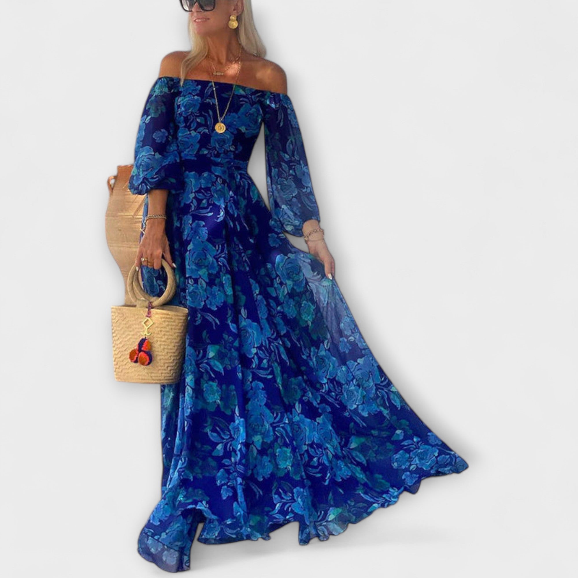 Soledad | Vestido largo de flores con hombros descubiertos y cuerpo fruncido, ideal para las vacaciones