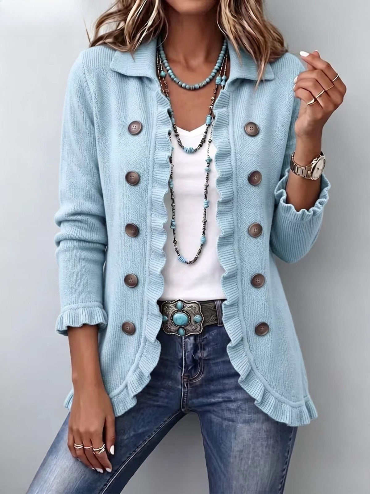 Úrsula | Chaqueta de punto de canalé azul empolvado con volantes