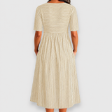 Valvanera | Vestido midi de rayas con botones y bolsillos