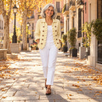 Zahara | Chaqueta de punto de canalé crema con volantes, en la calle