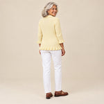 Zahara | Chaqueta de punto de canalé crema con volantes, vista de espaldas